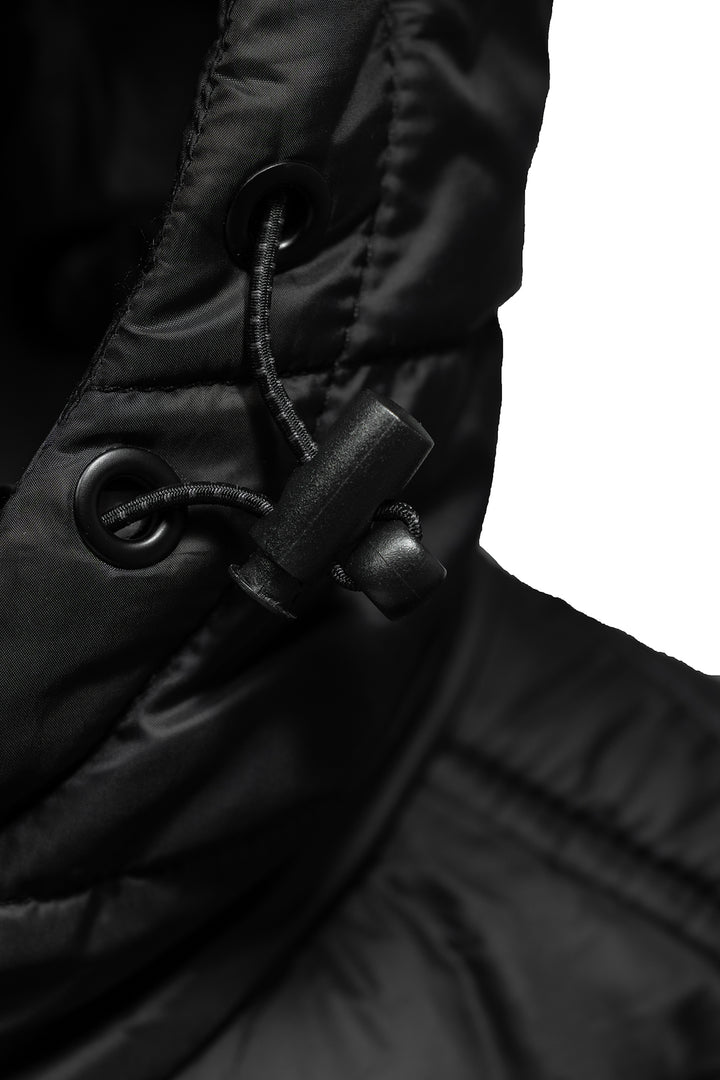 Close-up of a black jacket hood details on a white background