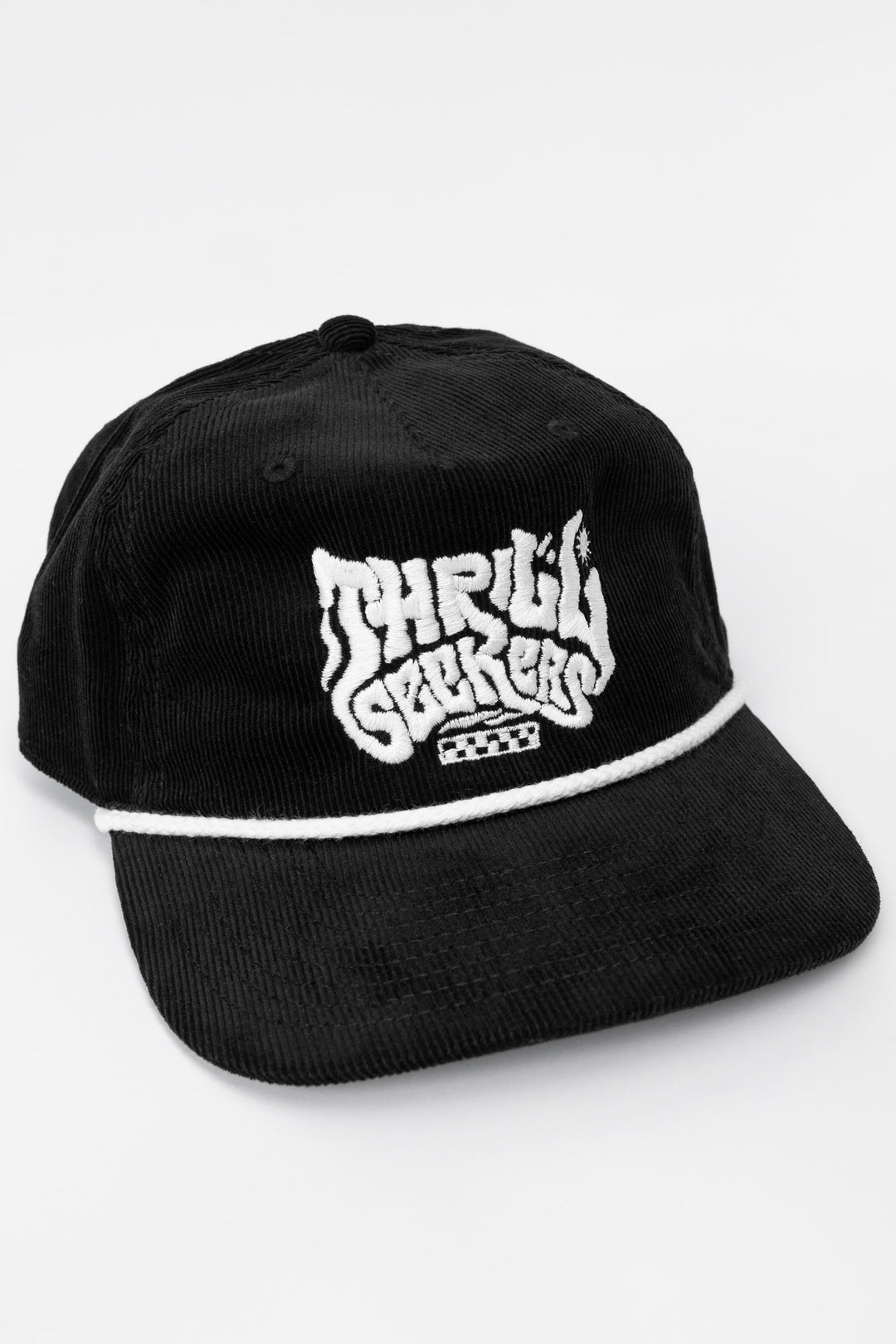 Black cap corduroy with 'Thrill Seekers' smokin' white logo on a white background