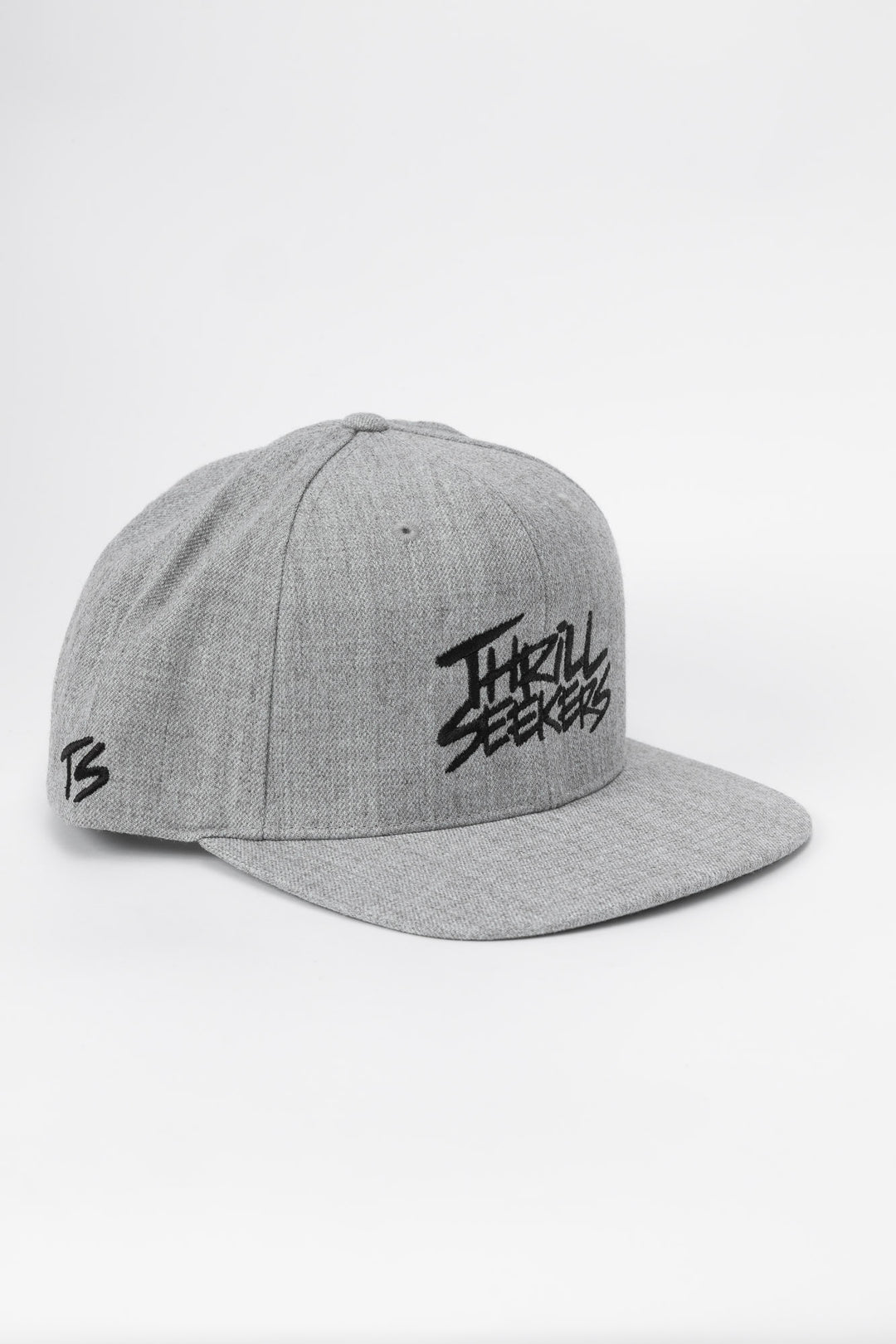 Grey snapback hat with 'Thrill Seekers' logo in black