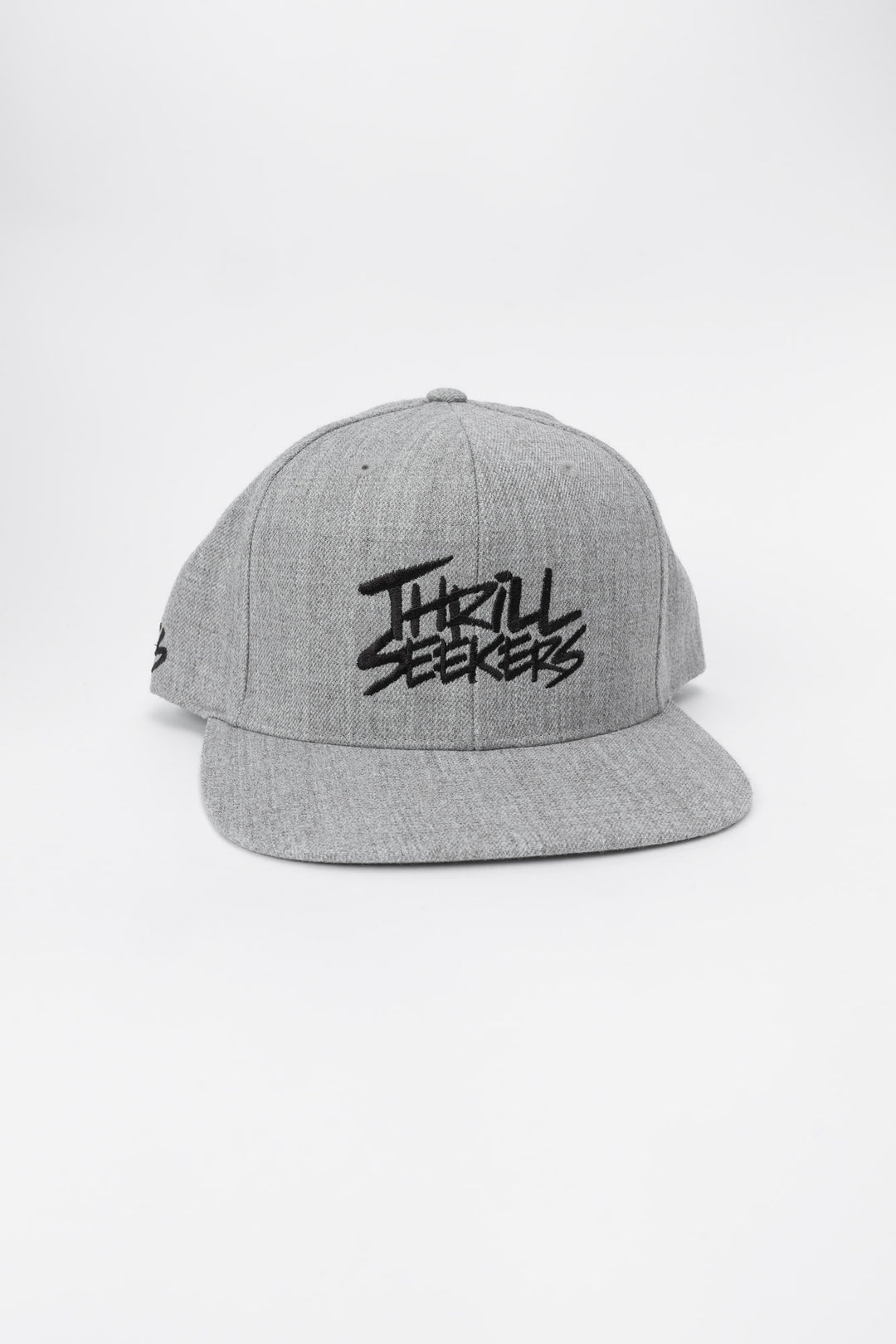Grey snapback hat with 'Thrill Seekers' logo in black