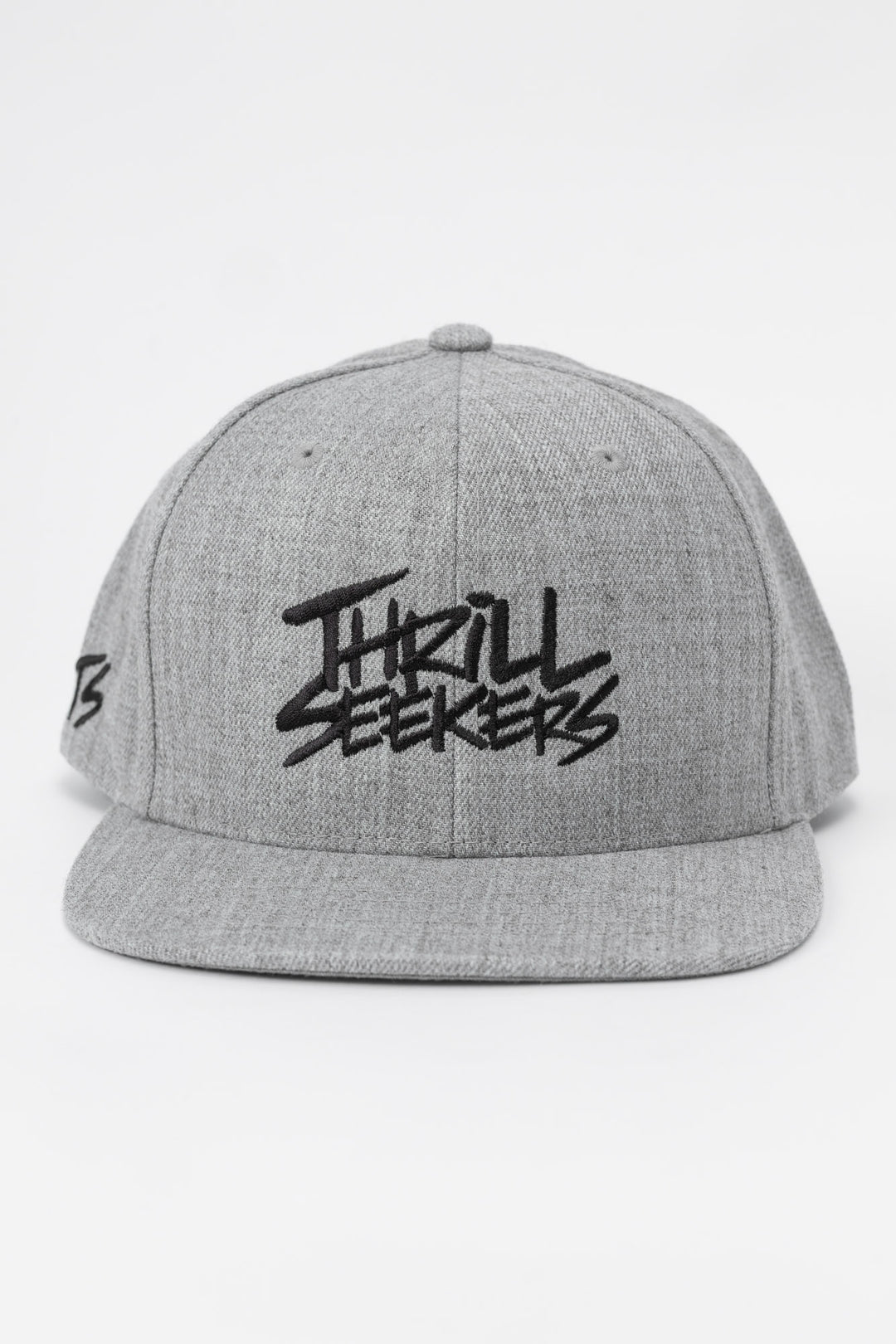 Grey cap with black 'Thrill Seekers' logo on a white background