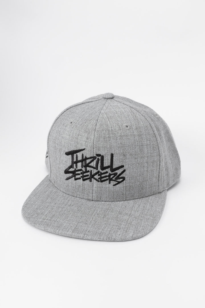 Grey cap with black 'Thrill Seekers' logo on a white background