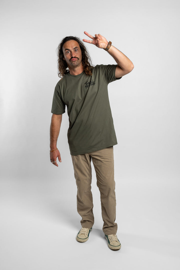 Person wearing a cypress tee with 'Thrill Seekers' logo in black