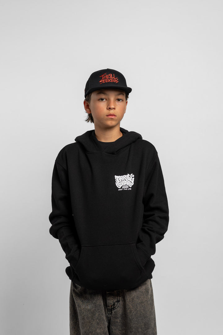 Kid wearing black hoodie with 'Thrill Seekers' smokin' logo in black
