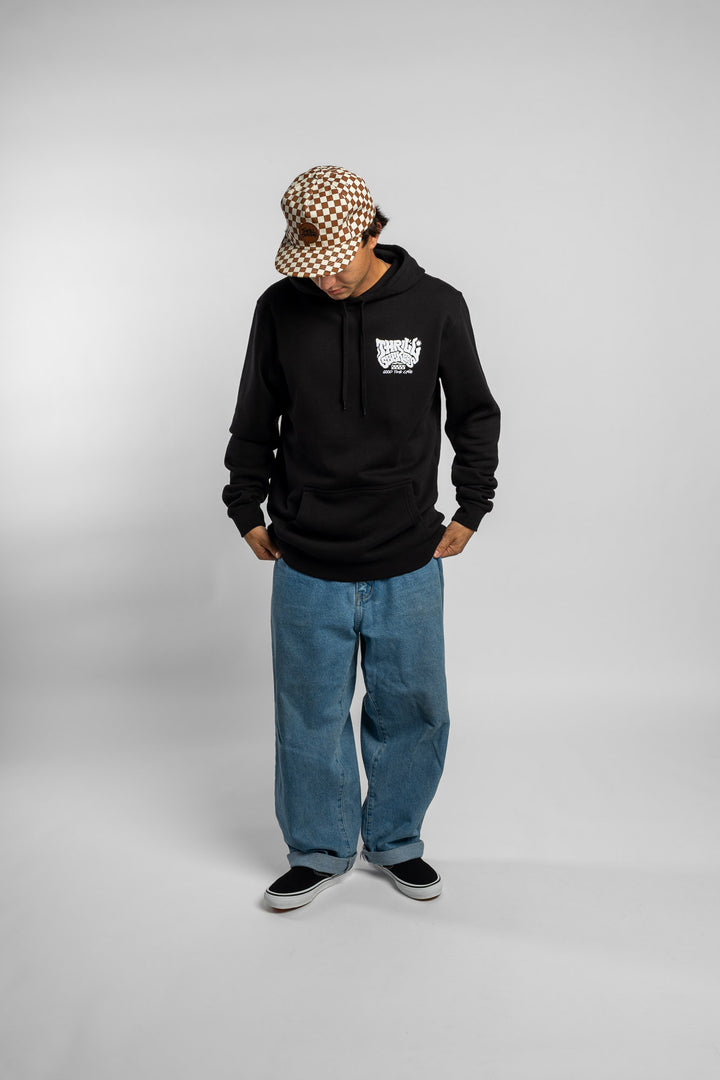 Person wearing a black hoodie with a 'Thrill Seekers' smokin' logo in white